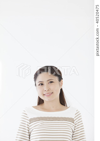 A Japanese woman with a smile A Japanese woman with a smile 40520475
