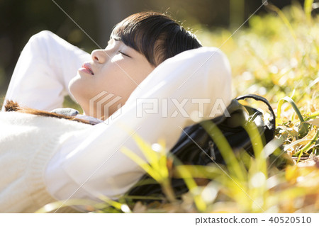 Schoolgirl closing her eyes Schoolgirl closing her eyes 40520510