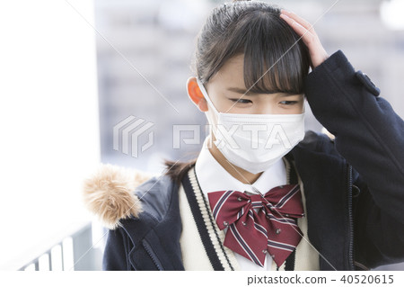 School girl doing a mask School girl doing a mask 40520615