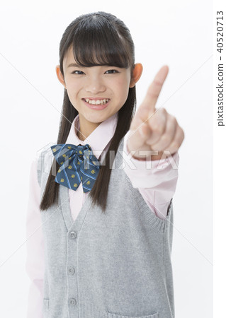 Female college student who stands index finger Female college student who stands index finger 40520713