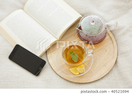 Tea set placed on bed 40521094