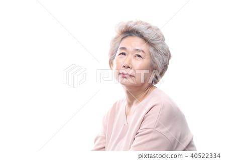 Oriental woman's facial expression, senior, middle-aged, elderly, grandmother, close-up, sadness, solitude, health 40522334