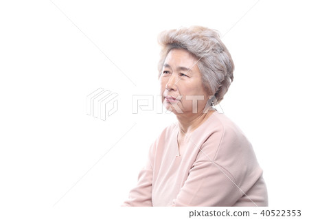 Oriental woman's facial expression, senior, middle-aged, elderly, grandmother, close-up, sadness, solitude, health 40522353
