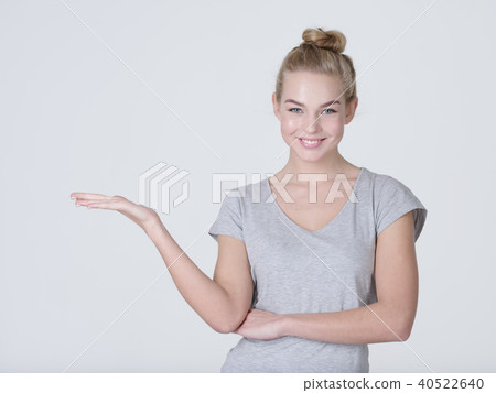 Beautiful young caucasian woman show palm hand. Beautiful young caucasian woman show palm hand. 40522640