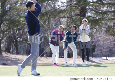 Men and women playing golf Men and women playing golf 40524128