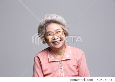 Oriental woman's facial expression, senior, middle-aged, elderly, grandmother, close-up, presbyopia, sight, health Oriental woman's facial expression, senior, middle-aged, elderly, grandmother, close-up, presbyopia, sight, health 40525823
