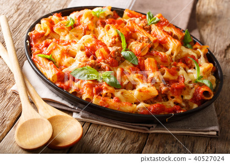 Casserole ziti pasta with minced meat, tomatoes Casserole ziti pasta with minced meat, tomatoes 40527024