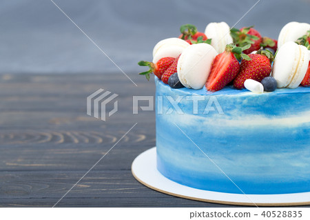 Sweet cake with strawberries on plate Sweet cake with strawberries on plate 40528835