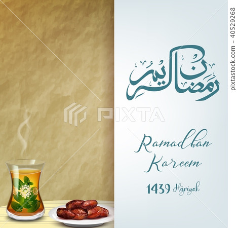 Ramadan kareem iftar. Bowl of dates with a glass o 40529268