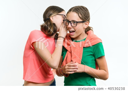 Portrait of two 12-13 year old girls. 40530238