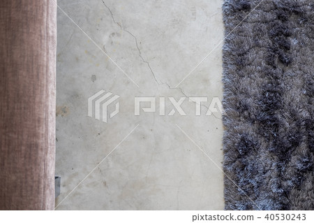 Dark gray soft carpet cement floor from above Dark gray soft carpet cement floor from above 40530243