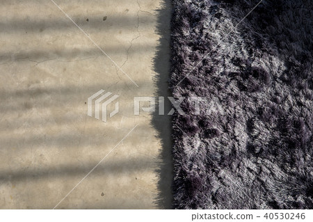 Dark gray soft carpet concrete floor from above. Dark gray soft carpet concrete floor from above. 40530246