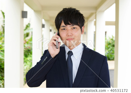 Businessmen talking on smartphone 40531172