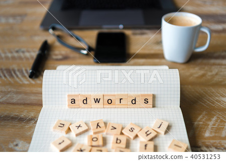 Closeup on notebook over wood table background 40531253