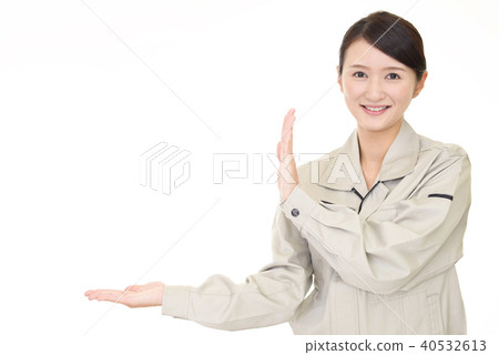 A smiling female worker A smiling female worker 40532613