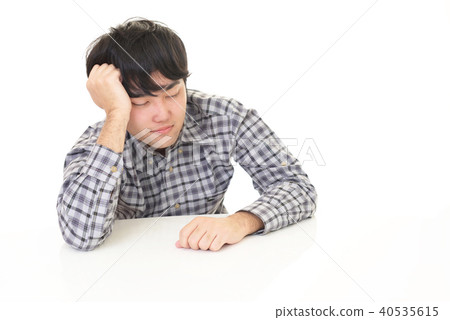 A man suffering 40535615