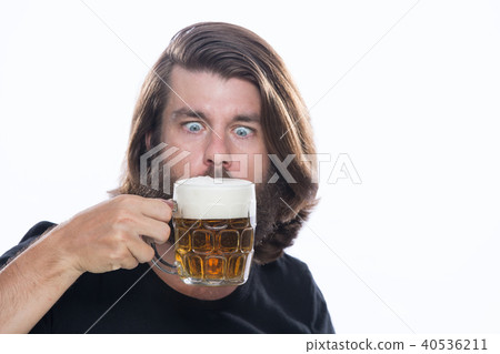 Man with a glass of beer isolated on white Man with a glass of beer isolated on white 40536211
