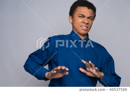 Annoyed African American teenager is disgusted. Annoyed African American teenager is disgusted. 40537589