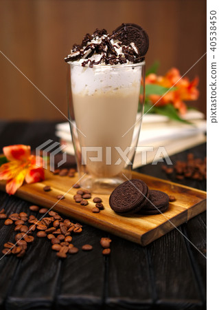 coffee cocktail with cream and cookie  40538450