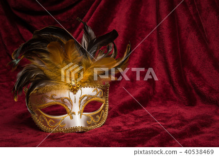 Venetian carnival mask on red velvet Venetian carnival mask on red velvet 40538469