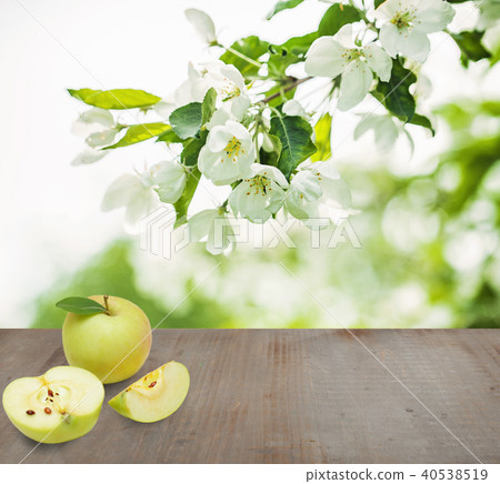 Green apple fruits on gray abstract background Green apple fruits on gray abstract background 40538519