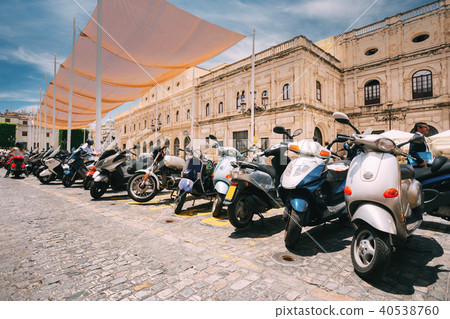 Seville, Spain. Motorbikes, Motorcycles, Scooters Parked In City 40538760