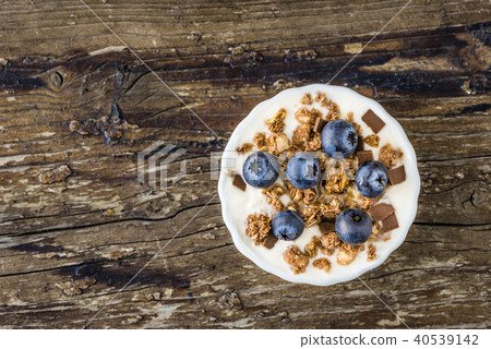 Yogurt with Fresh Blueberries on Woden Table Yogurt with Fresh Blueberries on Woden Table 40539142