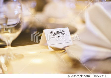 paper label (mock up) on the dinner table paper label (mock up) on the dinner table 40539318