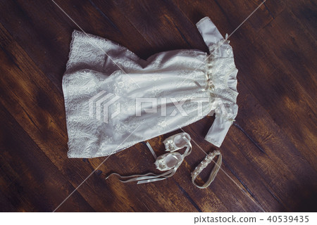 christening baby dress and shoes. Close-up  40539435