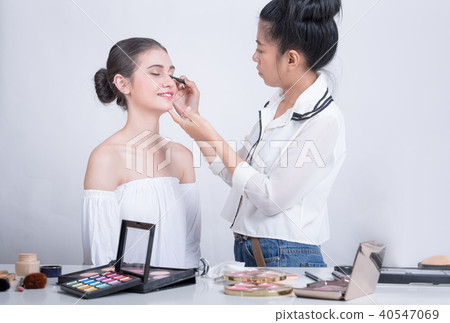 Beautiful woman make up by make up artist. Beautiful woman make up by make up artist. 40547069