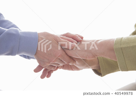 Two women holding hands Two women holding hands 40549978