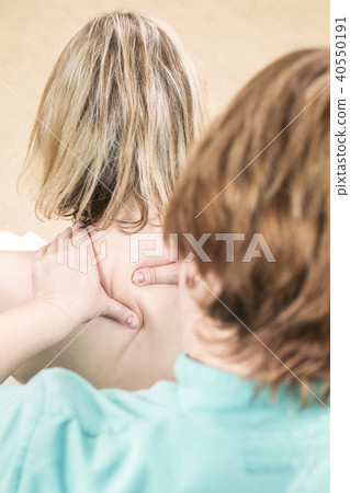 Massage of the cervical spine Massage of the cervical spine 40550191