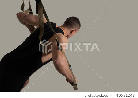 Arms muscles training on TRX bodybuilder Arms muscles training on TRX bodybuilder 40551248