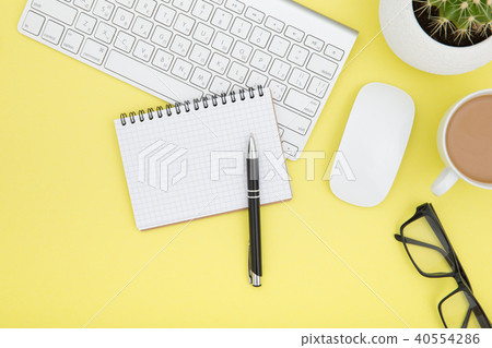 workspace with tablet, keyboard, coffee cup workspace with tablet, keyboard, coffee cup 40554286