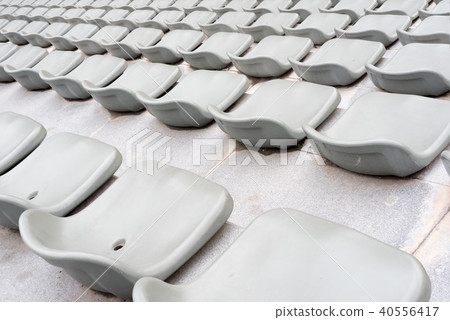 Empty gray stadium seats Empty gray stadium seats 40556417