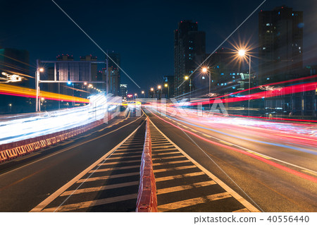 Traffic at night on a chinese elevated highway Traffic at night on a chinese elevated highway 40556440