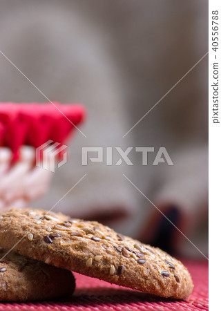Cookies with sesame and sunflower seeds on table Cookies with sesame and sunflower seeds on table 40556788