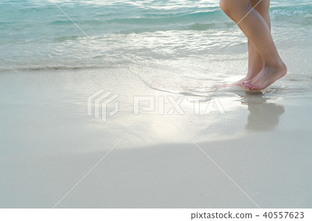 travel girl walking on white sand beach relax time 40557623
