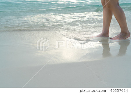 travel girl walking on white sand beach relax time 40557624