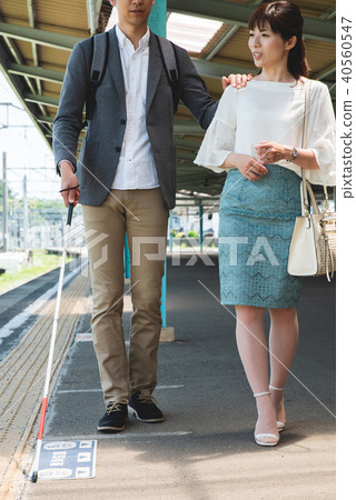 Male photography cooperation using white cane "Keio Electric Railway Co., Ltd." 40560547