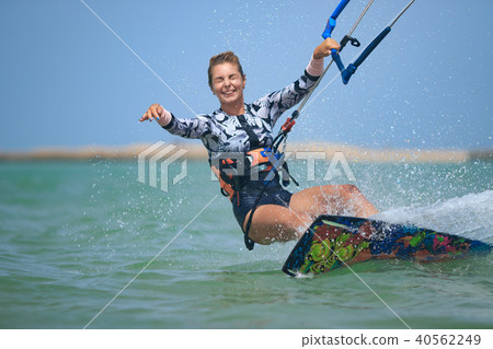 Kite surfing girl in sexy swimsuit with kite 40562249