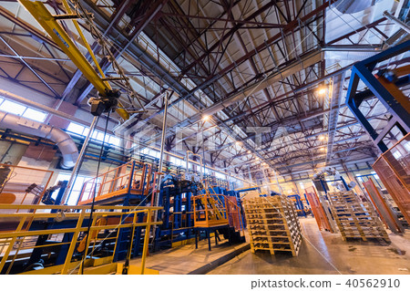 Fiberglass production industry equipment at manufacture background 40562910