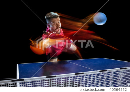 The table tennis player serving 40564352