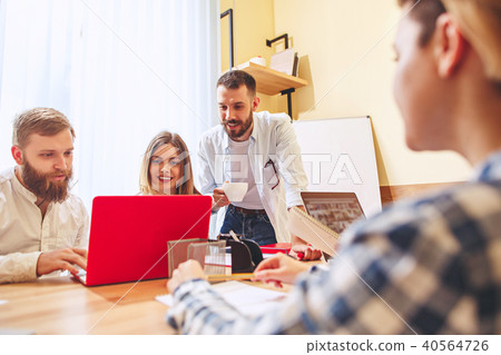Team job. Photo young businessmans working with new project in office 40564726