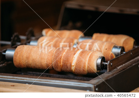 Prague, Czech Republic. Trdelnik Or Trdlo Is A Traditional Delicacy Prague, Czech Republic. Trdelnik Or Trdlo Is A Traditional Delicacy 40565472