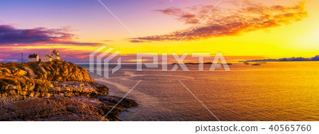 Sunset over the lighthouse in Henningsvaer on Lofoten islands 40565760