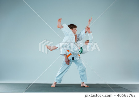 The two boys fighting at Aikido training in martial arts school. Healthy lifestyle and sports 40565762