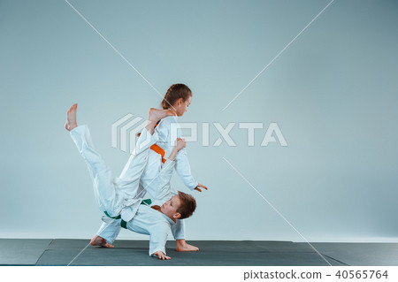 The boy fighting at Aikido training in martial arts school. Healthy lifestyle and sports concept 40565764