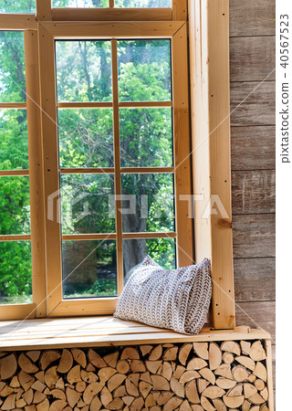 Bright room interior with curtains, wooden window sill and pillows 40567523