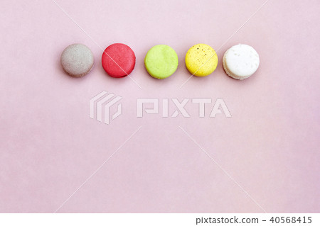 macaroons on the pink background space for text 40568415